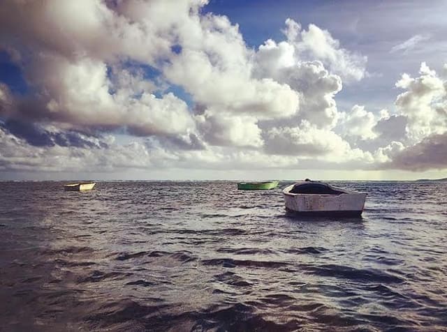 Boats Moored on Water