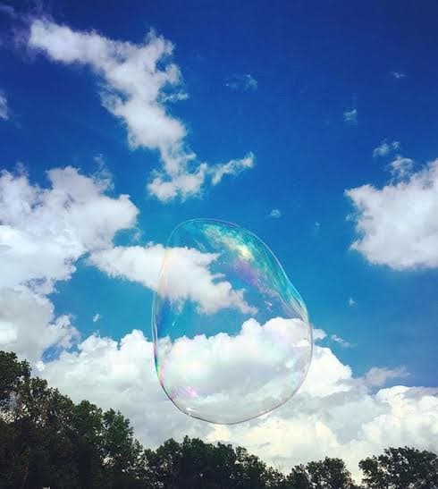 Giant Soap Bubble Blue Sky