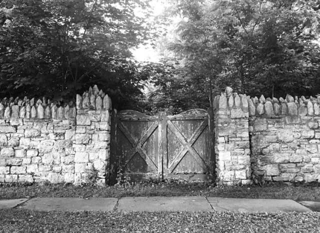 Rustic Wooden Gate Stone Wall